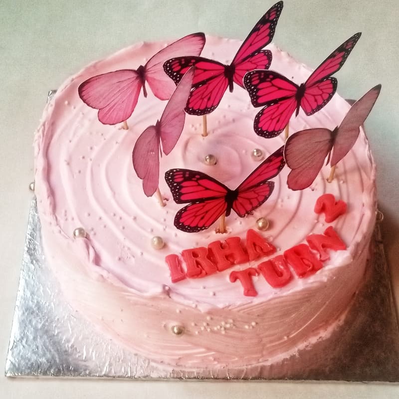 Pink butterflies theme cake