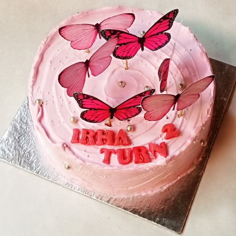 Pink butterflies theme cake